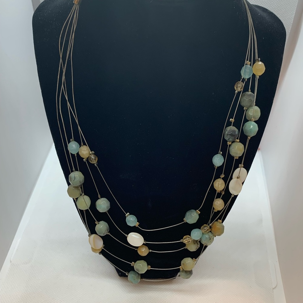 Five-strand drop tear necklace. Multiple stone. Easy lobster claw clasp.